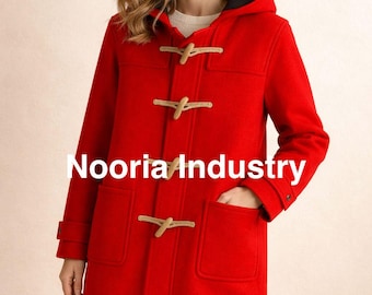 May include: A bright red duffel coat with a hood and wooden toggle closures. The coat has two large front pockets and the text "Nooria Industry" is visible on the front. The coat is a classic outerwear piece.