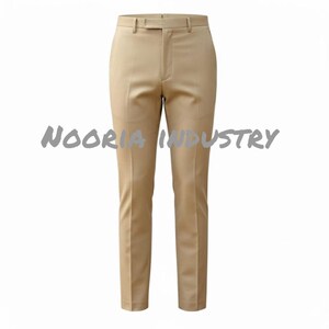 May include: Tan-colored dress pants with a straight leg and a belt loop waistband. The pants have a classic design and are made of a smooth fabric. The text "NOORIA INDUSTRY" is printed across the pants.