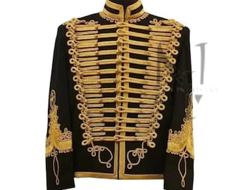 May include: A black jacket with gold braid trim and a high collar. The jacket has a decorative design on the front and sleeves.