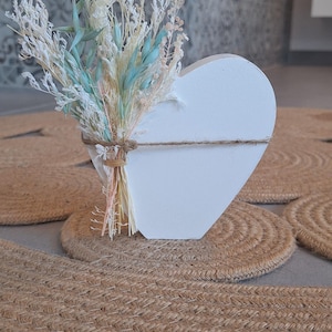 Wooden heart with dried flowers decoration