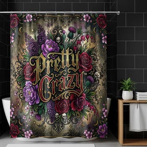 May include: A shower curtain with a floral design and the words "Pretty Crazy" in gold lettering. The design features red roses, purple peonies, and other flowers, with skulls and keys. The background is a dark, textured pattern.