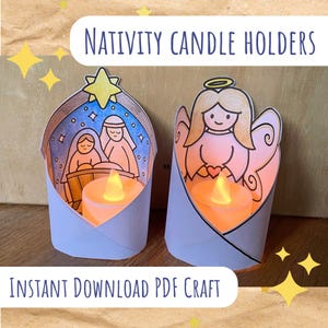 May include: Two paper Nativity candle holders with LED candles. One depicts the Nativity scene, the other an angel. The text "Nativity Candle Holders" and "Instant Download PDF Craft" are visible.