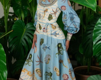Vestido midi vintage marino con estampado de pulpo y conchas, mangas abullonadas