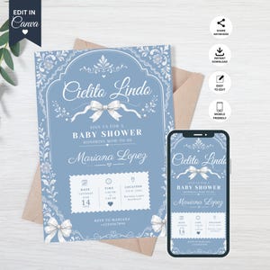 Könnte beinhalten: Eine staubblaue Babyparty-Einladungskarte und ein passendes Smartphone-Display mit weißen floralen Filigranrändern, einer zentralen weißen Schleife und dem Text Cielito Lindo, Join us for a baby shower, honoring Mariana Lopez.