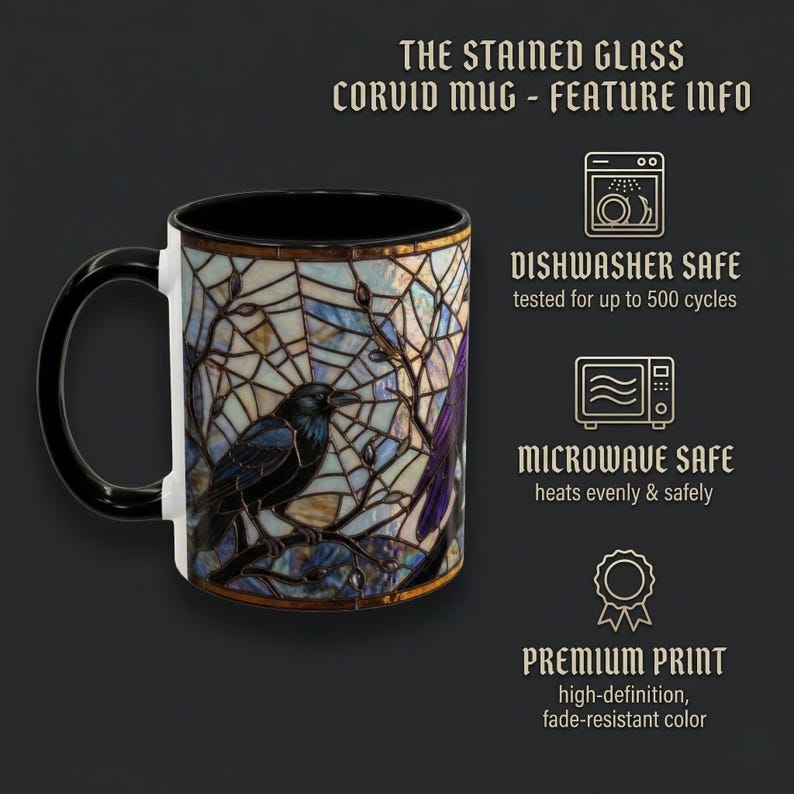 May include: A black and white ceramic mug with a stained glass design featuring a raven perched on a branch. The mug has a black handle and interior, with text that reads "THE STAINED GLASS CORVID MUG - FEATURE INFO".