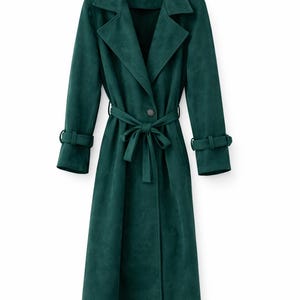 May include: A long, emerald green trench coat with a matching belt tied at the waist. The coat features a classic lapel collar, button closure, and long sleeves with cuff details. The coat is made of a soft, suede-like material.