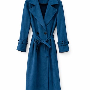May include: A long, teal blue trench coat with a double-breasted closure and a matching belt. The coat features a notched collar, long sleeves with cuff details, and a knee-length hemline. The coat is made of a soft, textured fabric.