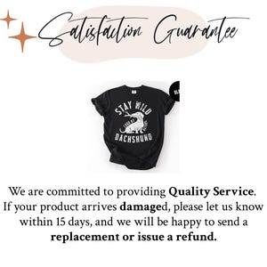 May include: Black t-shirt with a white graphic of a dachshund and the words "Stay Wild, Look at Dachshund". The words "Satisfaction Guarantee" are above the shirt.