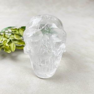Talla de cráneo de cuarzo claro (EPJ-HGCA14-3)
