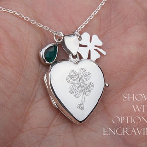 Peut inclure: Collier avec médaillon en forme de cœur en argent, avec un charme trèfle et une pierre précieuse verte. Le médaillon présente un trèfle en nœud celtique gravé. Affiché avec une gravure en option.
