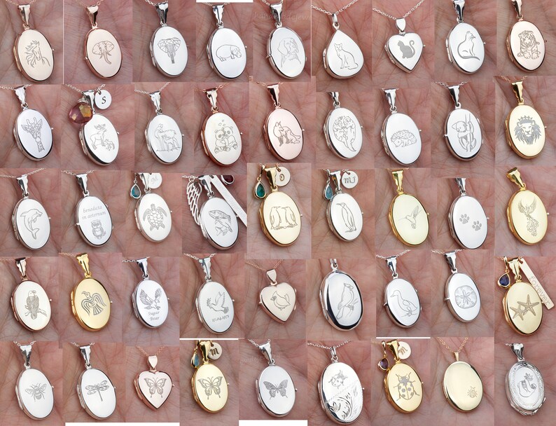 May include: A collection of silver and gold oval locket pendants with various engraved designs, including animals, nature scenes, and abstract patterns. The lockets are displayed on a hand, showcasing their size and detail.