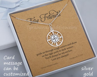 May include: A silver compass necklace in a white box with a brown card that reads "True Friends" and "guide us through tough waters and show us the right path in dark waters. You'll always be my anchor. Love you always!!"