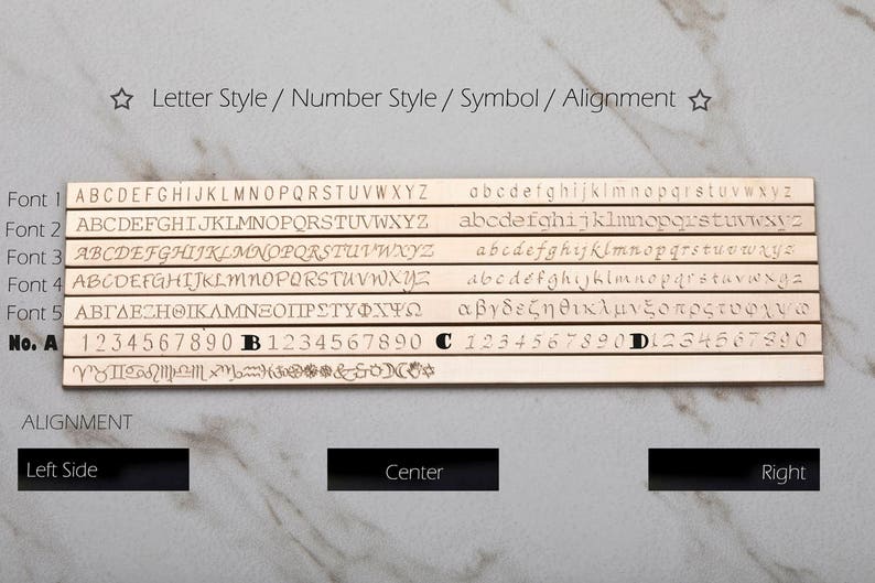 May include: A display of engraved metal strips showcasing various fonts, numbers, symbols, and alignment options. The image includes examples of uppercase and lowercase letters, numbers, and symbols, with options for left, center, and right alignment.