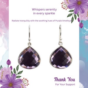 May include: A pair of silver earrings featuring teardrop-shaped purple amethyst stones. The earrings are set against a background of purple flowers and green leaves. The text "Whispers serenity in every sparkle" and "Radiate tranquility with the soothing hues of Purple Amethyst" is displayed above the earrings. The text "Thank You For Your Support" is displayed below the earrings.
