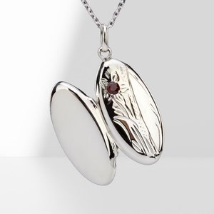Long oval sterling silver photo locket with garnet,oblong silver locket with etched flower pattern,memorial locket ,January birth locket