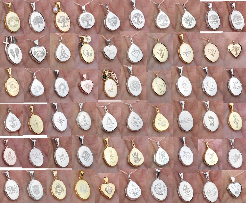 May include: A collection of silver and gold oval and teardrop shaped lockets with various engraved designs. The lockets are on chains and are displayed on a hand.