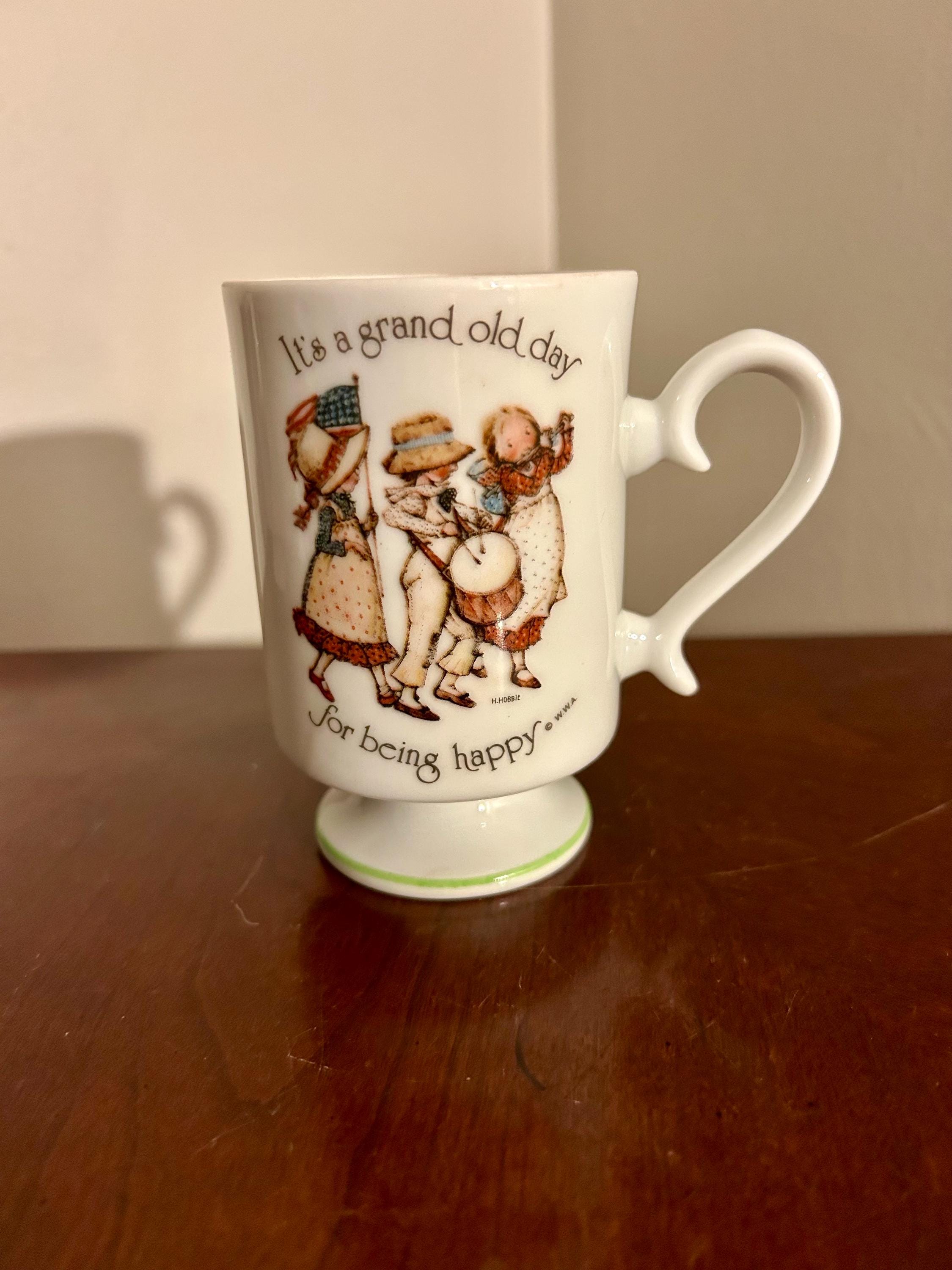 Vintage 1974 Holly Hobbie Footed Mug With Happy Message & Heart