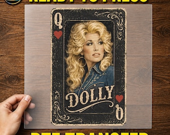 May include: A rectangular DTF transfer sheet featuring a playing card design with a portrait of a blonde woman with voluminous hair wearing a denim shirt. The card includes the letter Q, the name DOLLY, and red heart symbols on a black background.