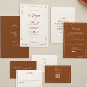May include: A collection of wedding stationery in shades of brown and cream. The set includes invitations, RSVP cards, and detail cards. The main invitation features the names "Anna & Paul" and the date "28 June". Decorative floral elements and elegant fonts enhance the design.