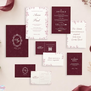 Può includere: Un set di cancelleria per matrimoni composto da cartoncini bordeaux scuro e bianchi con bordi floreali. Il set include un invito, una scheda dei dettagli, schede RSVP con codici QR e una scheda per i desideri, con un'elegante tipografia serif.