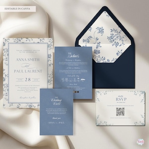 K&ouml;nnte beinhalten: Ein Hochzeitskarten-Set mit einem marineblauen Umschlag mit floralem Innenfutter, Einladung, Detailkarte, Wunschkarten und RSVP-Karte. Die Einladung enth&auml;lt die Namen "Anna Smith" und "Paul Laurent" sowie das Datum "28. Juni 2026".