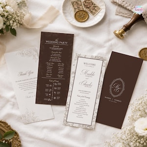May include: A set of four wedding stationery cards in dark brown and white. The cards feature floral borders, elegant typography, and text including The Wedding Party, Welcome to the wedding of Maddie Andrews and Charles Morgan, and Thank You.