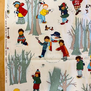 May include: Winter-themed fabric featuring children playing in the snow, building a snowman, and throwing snowballs. The fabric has a white background with illustrations of trees and children in winter clothing. The text "snowballs" and "THE ALEXANDER HENRY FABRICS COLLECTION © 2002" is printed on the fabric.