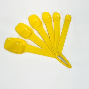 Vintage Tupperware Yellow Measuring Spoon Set of 6 Plastic with Ring Holder