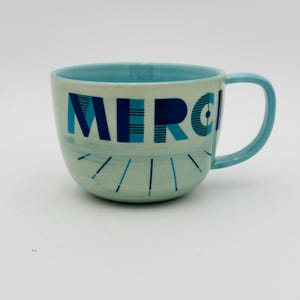 Vintage Merci Anthropologie Coffee Mug, French Thank You blue ceramic mug