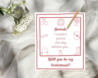 May include: A red-outlined card with the text "Hannah, I couldn't picture this day without you... Will you be my bridesmaid?" and various illustrations, including cherries, a disco ball, and a ring.