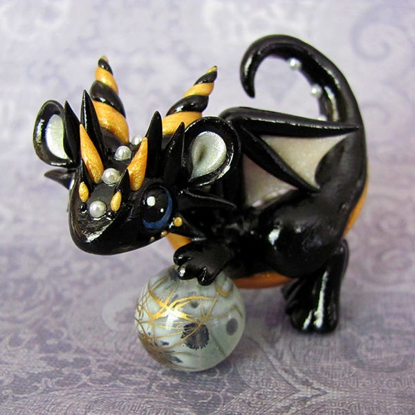 Black Baby Dragon with Orb