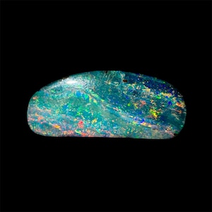 May include: A polished opal gemstone with a vibrant display of colors. The stone features a mix of blues, greens, and flashes of red and yellow, set against a dark background. The opal's surface is smooth and reflective, showcasing its unique patterns.