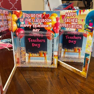 May include: A multi-panel Teacher's Day greeting card with colorful balloons and text. The card features the phrases "Roses are red, violets are blue..." and "You're the of the classroom, Happy Teacher's Day."