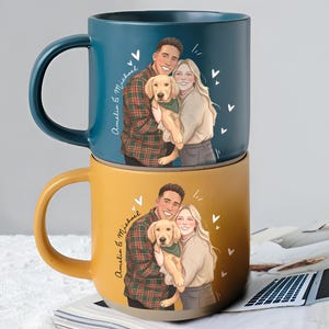 May include: Two ceramic mugs stacked on top of each other. The top mug is teal, and the bottom mug is mustard yellow. Each mug features a portrait of a couple with a dog, with the names "Amelia & Michael" written on the side.