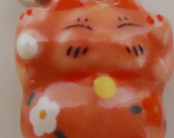 The Japanese Little Lucky Cat Charm.