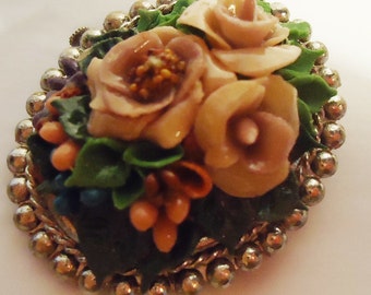 The Antique Spanish Flower Resin Brooch .From the 40s