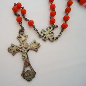 The Red Cased Rosary. 70s.