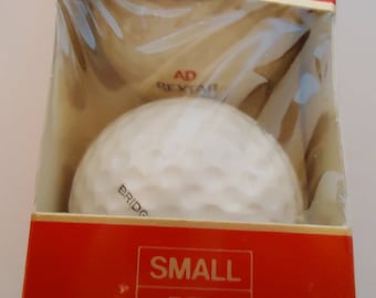 Three Vintage Golf Balls, Super Velocity, AD Rextar from the 70s and In the Original box, bridgestone gold balls