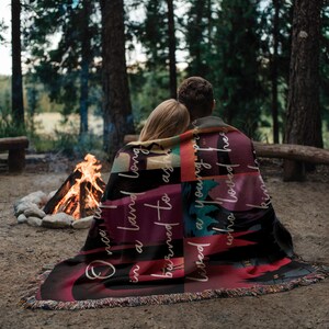 Throne of Glass woven blanket featuring Kingdom of Ash inspired scenes with Aelin Galathynius, fantasy bookish decor, cozy reading throw gift for fans