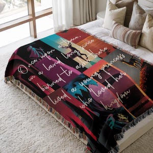 Throne of Glass woven blanket featuring Kingdom of Ash inspired scenes with Aelin Galathynius, fantasy bookish decor, cozy reading throw gift for fans