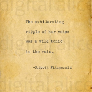 May include: A print on aged paper with a quote by F. Scott Fitzgerald. The text, in a typewriter font, reads "The exhilarating ripple of her voice was a wild tonic in the rain."