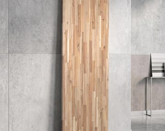 May include: A tall, rectangular wooden panel constructed from multiple vertical strips of light-colored wood with varying grain patterns and natural tan and cream tones, featuring a smooth, flat surface and a clean, straight-edged design.