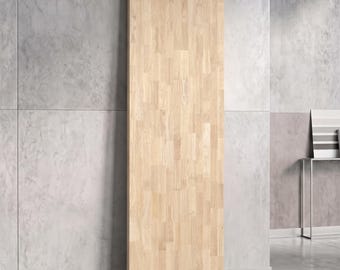 May include: A tall, rectangular wooden door panel featuring a light beige color and a vertical grain pattern composed of multiple joined wood segments. The surface displays natural wood textures and variations in tone across the entire length.