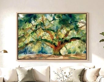May include: A horizontal rectangular wall art piece featuring a watercolor painting of a large, spreading tree with a thick brown trunk and expansive branches covered in lush green and blue foliage, framed in a light-colored wooden frame.