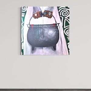 May include: An artistic painting depicts a dark gray cauldron held by hands adorned with rings. The cauldron has three legs and is suspended by a metal handle. Several strands of beads hang from the cauldron. The background features white fabric and green decorative elements.