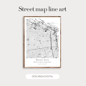 Op de afbeelding: Een zwart-wit straatkaart in een lijst van Buenos Aires, Argentinië. De print bevat de naam van de stad en de coördinaten. De tekst "Street map line art" staat bovenaan en "Descarga Digital" onderaan.