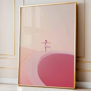 Pode incluir: Impressão artística emoldurada com uma ilustração minimalista de uma pessoa em pose de balé. A obra de arte usa uma paleta de tons rosa e pêssego, com uma moldura dourada. A figura é retratada com os braços estendidos, usando uma saia branca.
