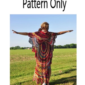 May include: A colorful crochet top with a long, flowing design. The top is made with a variety of colors, including red, orange, yellow, green, blue, and purple. The top is shown being worn by a person standing in a field.