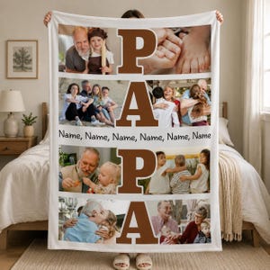 May include: A white personalized blanket featuring family photos and the word "PAPA" in large brown letters. The blanket includes multiple family photos and the names of the family members. A heartwarming gift.