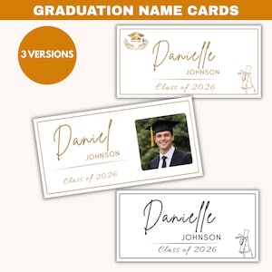 May include: Three graduation name cards with gold and black text. The cards feature names, the class year, and a graduation cap graphic. One card includes a photo of a graduate. The text on the cards reads "GRADUATION NAME CARDS" and "3 VERSIONS".